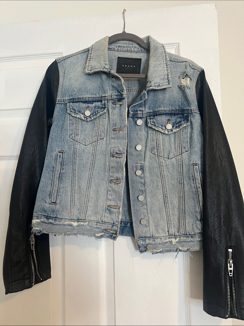 Blank NYC Light Blue Denim Jacket with Black Faux Leather Sleeves
